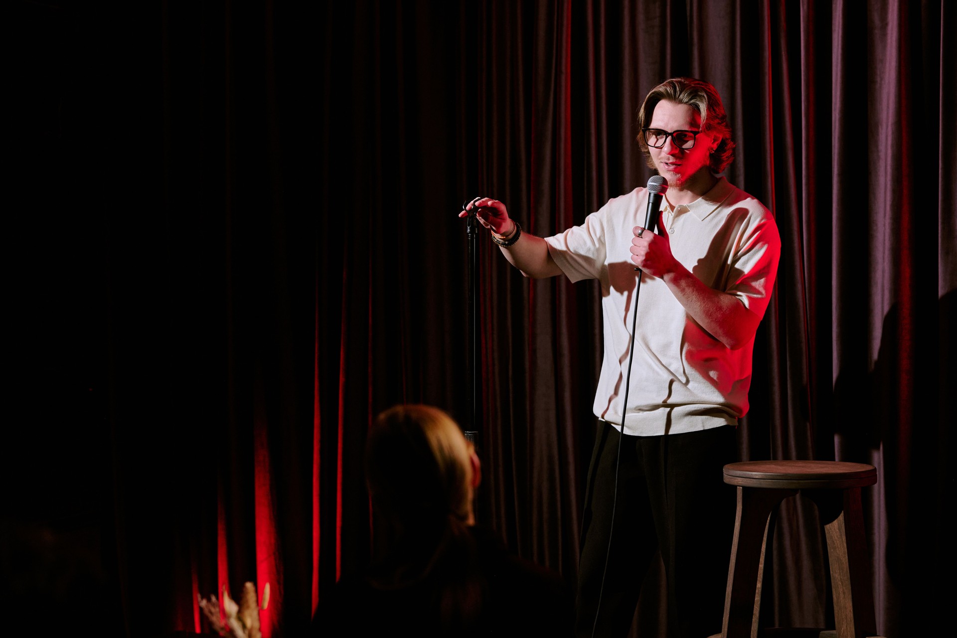 Delivering Stand-Up Comedy Routine on Stage